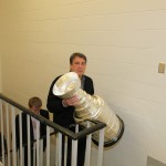 Cam Neely carries the Cup to the library.