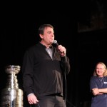 Cam Neely speaks to students during the assembly.