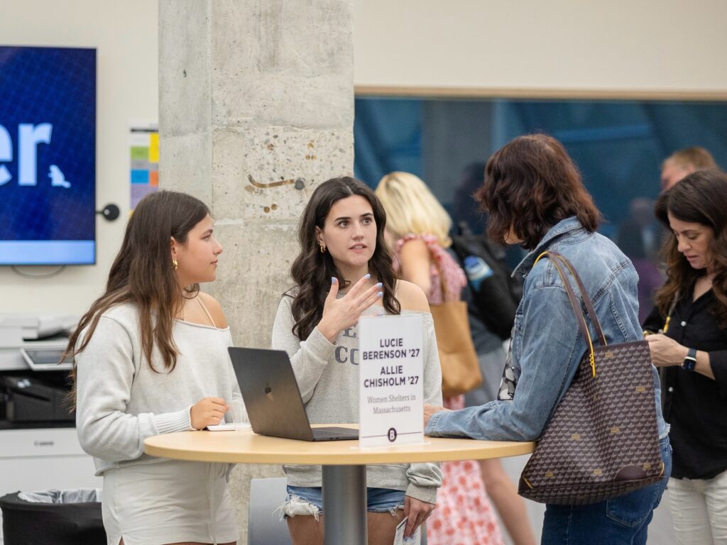 student presenting to an adult