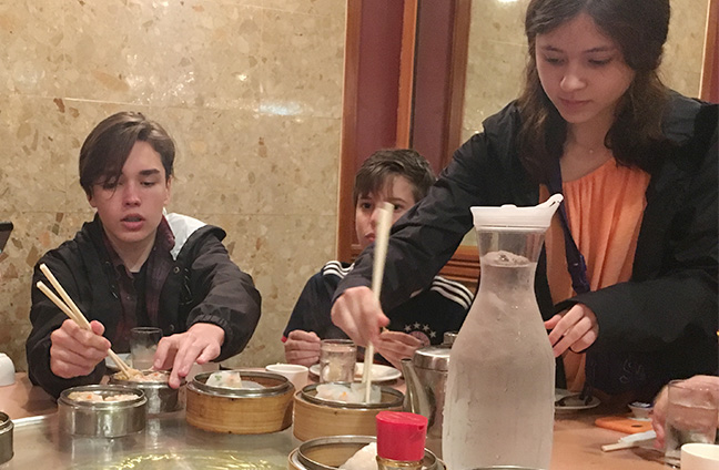 Students eating dim sum