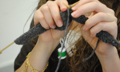 A MS student works on a knitting project