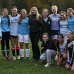 Leslie Osborne (center) with girls' varsity soccer