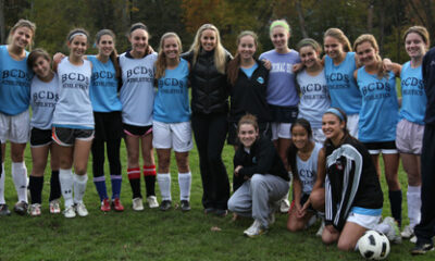 Leslie Osborne (center) with girls' varsity soccer