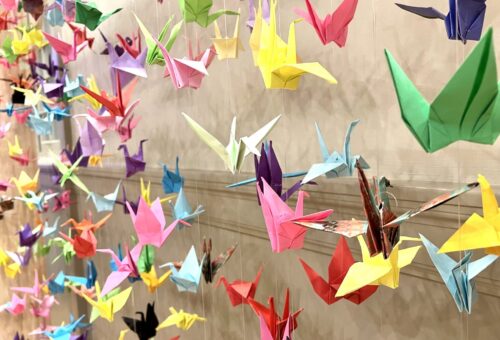 Colorful origami swan installation